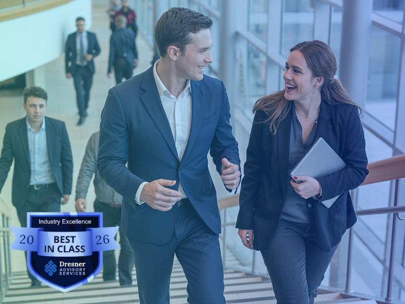 Business professionals walking together in an office building